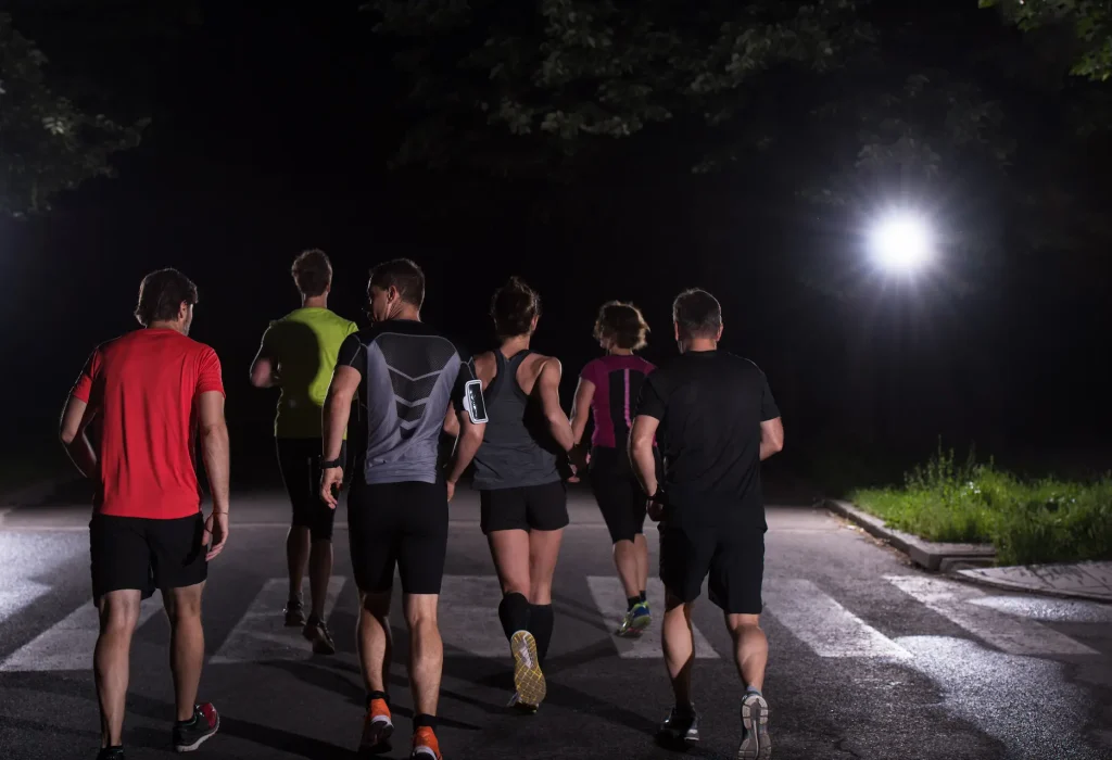 group-healthy-people-jogging-city-park-runners-team-night-training