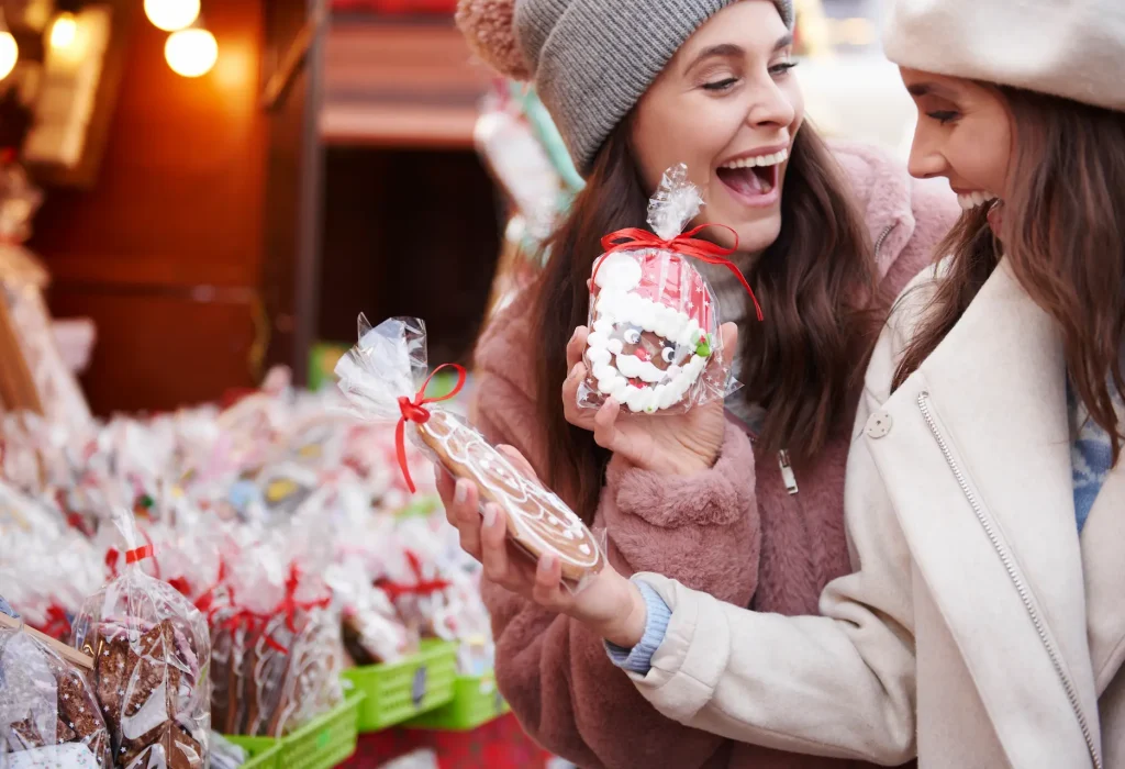 two-women-buying-ginger-breads-christmas-market